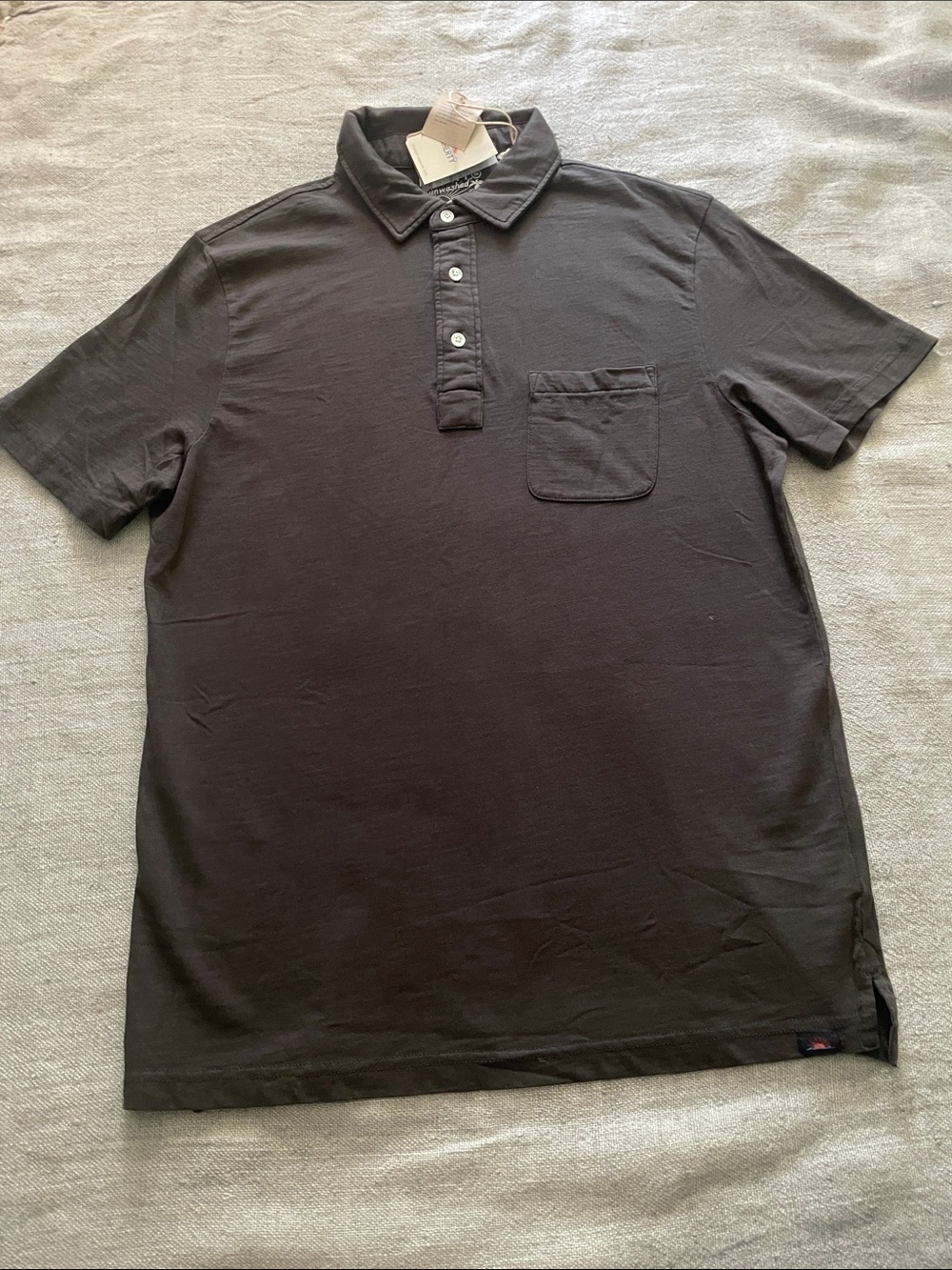 Brand new men’s “Faherty” polo